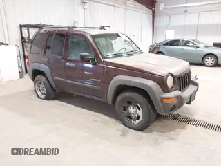 2004 Jeep Liberty Sport with VIN 1J4GL48K64W263786, listed as a IAAI auction lot 41825993 with 256,640 mi miles. Bid and sale history available at carsss.com. Image 1.