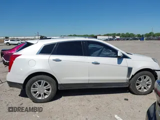 2016 Cadillac SRX Luxury Collection z VIN 3GYFNBE3XGS505311, wystawiony jako IAAI lot #42066399 z przebiegiem 87 132 mil mil oraz . Historia ofert i sprzedaży dostępna na DreamBid. Obrazek 14.