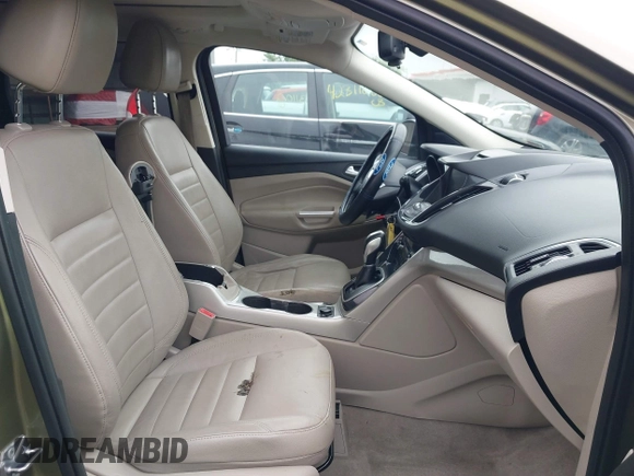 2013 Ford Escape SEL with VIN 1FMCU9H9XDUB61880, listed as a IAAI auction lot 42271136 with 115,837 mi miles and . Bid and sale history available at DreamBid. Image 5.