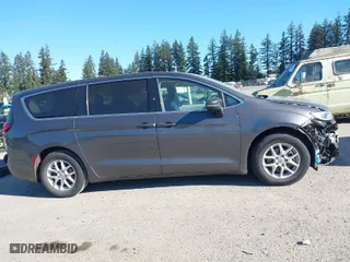 2023 Chrysler Pacifica Touring L with VIN 2C4RC1BG5PR550499, listed as a IAAI auction lot 42055738 with 53,137 mi miles. Bid and sale history available at carsss.com. Image 14.