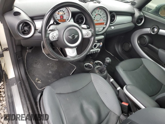 2007 MINI Hardtop with VIN WMWMF33567TT56922, listed as a Copart auction lot 56598665 with 66,605 mi miles and Salvage title. Bid and sale history available at DreamBid. Image 8.