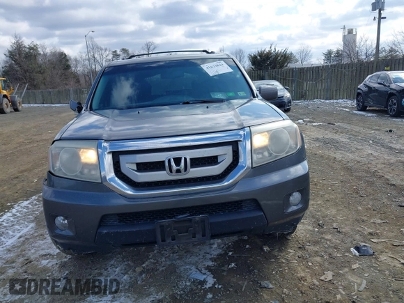 2011 Honda Pilot Touring with VIN 5FNYF4H98BB016012, listed as a IAAI auction lot 41634844 with 202,160 mi miles. Bid and sale history available at carsss.com. Image 12.