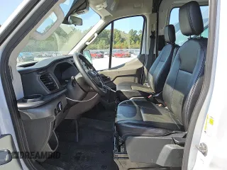 2023 Ford Transit Cargo with VIN 1FTBR3X82PKA82517, listed as a Copart auction lot 75703934 with 34,304 mi miles and Clean Title. Bid and sale history available at DreamBid. Image 7.