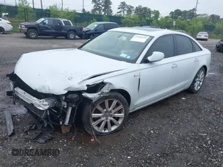 2014 Audi A6 Premium Plus z VIN WAUFGAFC4EN081900, wystawiony jako IAAI lot #42268150 z przebiegiem 150 238 mil mil oraz . Historia ofert i sprzedaży dostępna na DreamBid. Obrazek 2.