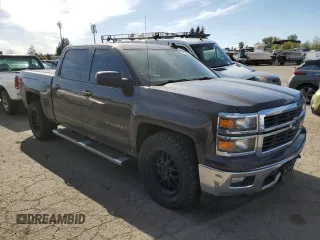 2015 Chevrolet Silverado 1500 LT with VIN 3GCUKREC9FG361511, listed as a Copart auction lot 53108195 with 139,157 mi miles and Salvage Title. Bid and sale history available at DreamBid. Image 4.