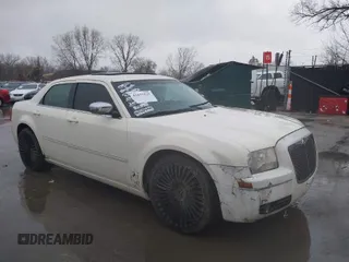 2006 Chrysler 300 Touring with VIN 2C3KA53G26H177749, listed as a IAAI auction lot 41655523 with 253,168 mi miles. Bid and sale history available at carsss.com. Image 1.