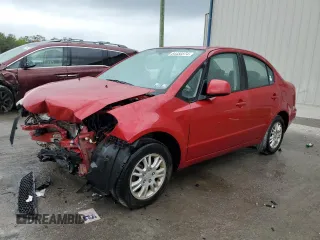 2013 Suzuki SX4 LE with VIN JS2YC5A36D6101956, listed as a Copart auction lot 84450374 with 61,704 mi miles and Salvage Title. Bid and sale history available at carsss.com. Image 1.