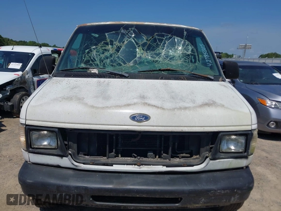 1998 Ford Econoline Cargo with VIN 1FTNS2421WHC08759, listed as a IAAI auction lot 42785005 with Not provided miles and . Bid and sale history available at DreamBid. Image 12.