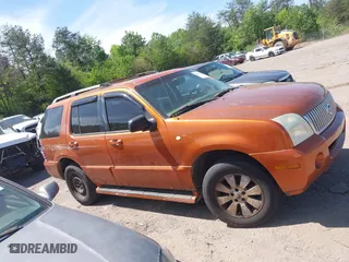 2004 Mercury Mountaineer Convenience with VIN 4M2DU66WX4ZJ03054, listed as a IAAI auction lot 42041152 with 280,326 mi miles. Bid and sale history available at carsss.com. Image 13.
