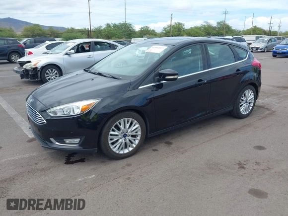 2017 Ford Focus Titanium z VIN 1FADP3N24HL326330, wystawiony jako IAAI lot #42594927 z przebiegiem 54 727 mil mil oraz . Historia ofert i sprzedaży dostępna na DreamBid. Obrazek 17.
