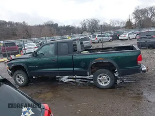 2000 Dodge Dakota Sport with VIN 1B7GG22N3YS539484, listed as a IAAI auction lot 41748568 with 290,117 mi miles. Bid and sale history available at carsss.com. Image 14.