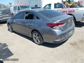 2019 Hyundai Sonata Sport with VIN 5NPE34AF8KH751764, listed as a IAAI auction lot 41751278 with 139,187 mi miles. Bid and sale history available at carsss.com. Image 3.