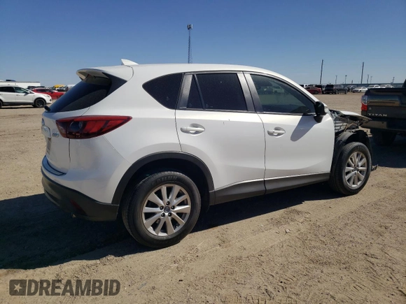 2016 Mazda CX-5 Touring with VIN JM3KE2CY7G0657113, listed as a Copart auction lot 46489835 with 166,399 mi miles and Salvage Title. Bid and sale history available at DreamBid. Image 3.