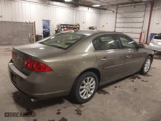 2010 Buick Lucerne CXL with VIN 1G4HC5EM4AU122627, listed as a IAAI auction lot 41836235 with 134,337 mi miles. Bid and sale history available at carsss.com. Image 4.