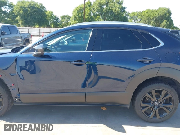 2021 Mazda CX-30 Premium with VIN 3MVDMBDYXMM307047, listed as a IAAI auction lot 41974966 with 53,409 mi miles and . Bid and sale history available at carsss.com. Image 15.