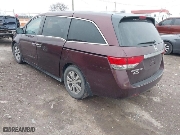 2015 Honda Odyssey EX-L with VIN 5FNRL5H68FB030104, listed as a IAAI auction lot 41684307 with 182,185 mi miles. Bid and sale history available at carsss.com. Image 3.