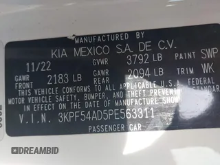 2023 Kia Forte GT-Line with VIN 3KPF54AD5PE563311, listed as a IAAI auction lot 42028015 with 54,900 mi miles. Bid and sale history available at carsss.com. Image 9.
