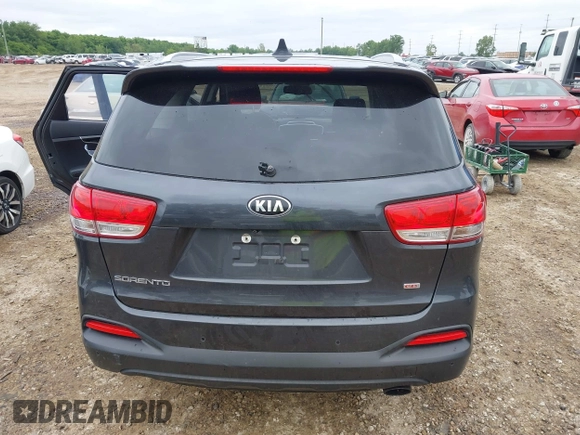 2017 Kia Sorento LX z VIN 5XYPG4A33HG274938, wystawiony jako IAAI lot #42341796 z przebiegiem 153 168 mil mil oraz . Historia ofert i sprzedaży dostępna na DreamBid. Obrazek 16.