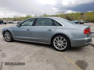 2013 Audi A8 3.0L with VIN WAURGAFD2DN026253, listed as a Copart auction lot 55476795 with 133,083 mi miles and Salvage title. Bid and sale history available at DreamBid. Image 2.