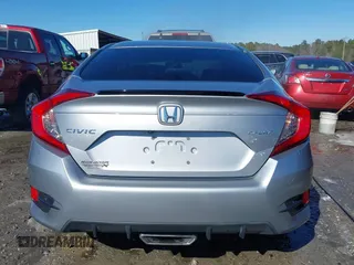 2019 Honda Civic Sport with VIN 2HGFC2F85KH605786, listed as a IAAI auction lot 41621480 with 66,438 mi miles and . Bid and sale history available at DreamBid. Image 17.
