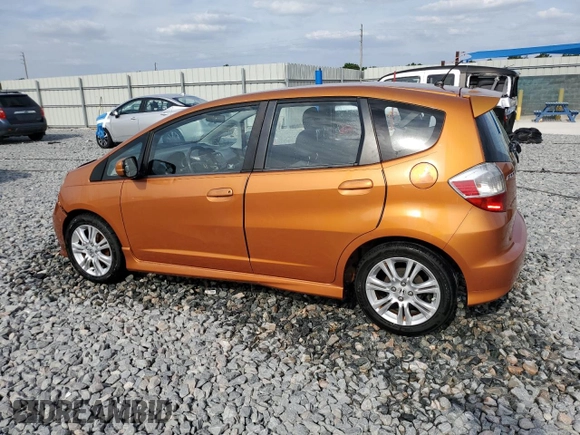 2011 Honda Fit Sport with VIN JHMGE8H59BC007883, listed as a Copart auction lot 54194635 with 123,256 mi miles and Salvage Title. Bid and sale history available at DreamBid. Image 2.