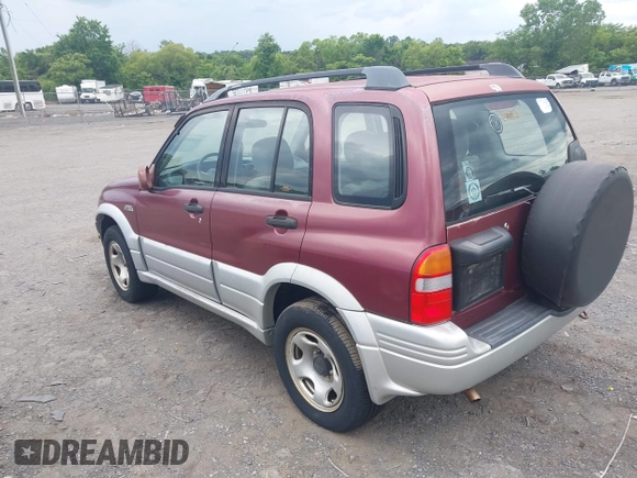 2000 Suzuki Grand Vitara JLX z VIN JS3TD62V7Y4119022, wystawiony jako IAAI lot #42384608 z przebiegiem 153 943 mil mil oraz . Historia ofert i sprzedaży dostępna na DreamBid. Obrazek 3.
