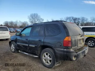 2005 GMC Envoy SLT with VIN 1GKDT13S552310799, listed as a Copart auction lot 43586125 with 182,928 mi miles and Salvage Title. Bid and sale history available at carsss.com. Image 2.