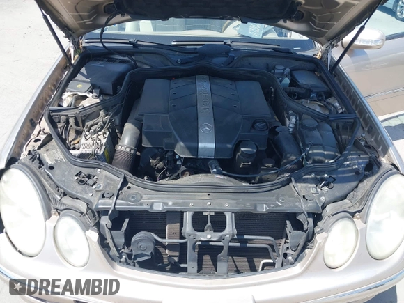 2003 Mercedes-Benz E-Class 3.2L with VIN WDBUF65JX3A236768, listed as a IAAI auction lot 42094824 with 251,896 mi miles. Bid and sale history available at carsss.com. Image 10.