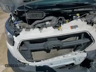 2023 Ford Transit Cargo z VIN 1FTBR3X84PKB10219, wystawiony jako Copart lot #60219385 z przebiegiem 83 059 mil mil oraz Szkoda całkowita • Salvage title. Historia ofert i sprzedaży dostępna na DreamBid. Obrazek 14.