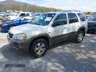 2001 Mazda Tribute LX with VIN 4F2YU09131KM12857, listed as a IAAI auction lot 42034605 with 257,015 mi miles and . Bid and sale history available at carsss.com. Image 2.