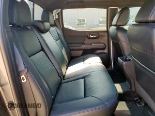 2021 Toyota Tacoma SR with VIN 3TMCZ5AN9MM451389, listed as a Copart auction lot 59191355 with 26,427 mi miles and Salvage title. Bid and sale history available at DreamBid. Image 10.