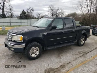2001 Ford F-150 SuperCrew XLT with VIN 1FTRW08L61KD76292, listed as a Copart auction lot 49850775 with 63,006 mi miles and Salvage Title. Bid and sale history available at carsss.com. Image 1.