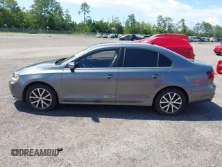 2017 Volkswagen Jetta SE with VIN 3VWDB7AJ4HM311934, listed as a IAAI auction lot 40417726 with 93,666 mi miles and . Bid and sale history available at DreamBid. Image 14.