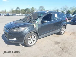 2015 Ford Escape Titanium with VIN 1FMCU9J94FUC33962, listed as a IAAI auction lot 41990795 with Not provided miles and . Bid and sale history available at DreamBid. Image 2.