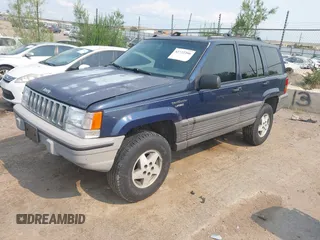 1994 Jeep Grand Cherokee Laredo z VIN 1J4GZ58Y7RC233746, wystawiony jako IAAI lot #42722206 z przebiegiem 196 875 mil mil oraz . Historia ofert i sprzedaży dostępna na DreamBid. Obrazek 2.