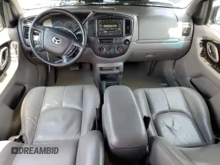 2002 Mazda Tribute LX with VIN 4F2CU09182KM28600, listed as a Copart auction lot 62314004 with 108,048 mi miles and Salvage Title. Bid and sale history available at carsss.com. Image 8.