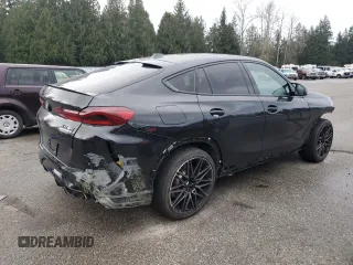 2024 BMW X6 M with VIN 5YM23ET08R9V15689, listed as a Copart auction lot 86357404 with 9,847 mi miles and Salvage Title. Bid and sale history available at carsss.com. Image 3.