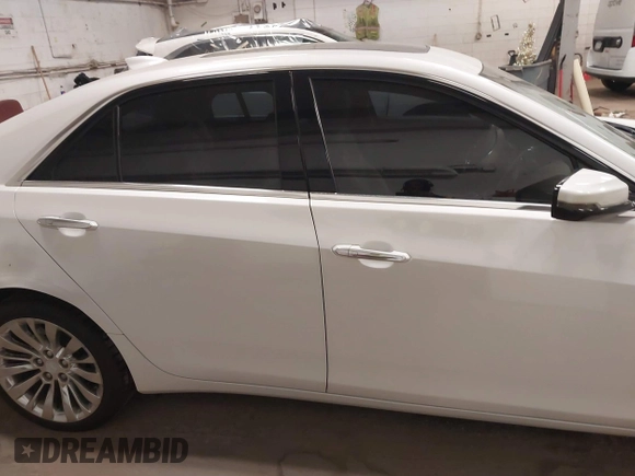 2016 Cadillac CTS Luxury Collection AWD with VIN 1G6AX5SS6G0125285, listed as a IAAI auction lot 42137355 with 110,299 mi miles and . Bid and sale history available at DreamBid. Image 13.