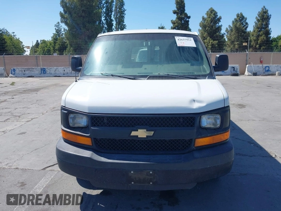 2014 Chevrolet Express Cargo with VIN 1GCSGAFXXE1200920, listed as a IAAI auction lot 42637911 with 205,182 mi miles and . Bid and sale history available at DreamBid. Image 12.