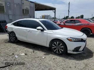 2024 Honda Civic EX z VIN 2HGFE1F76RH337854, wystawiony jako Copart lot #52706405 z przebiegiem 3 883 mil mil oraz Szkoda całkowita • Salvage title. Historia ofert i sprzedaży dostępna na DreamBid. Obrazek 4.