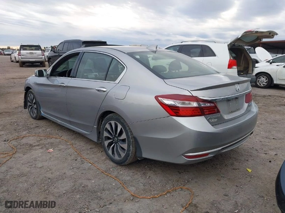2017 Honda Accord Hybrid Touring with VIN JHMCR6F75HC016374, listed as a IAAI auction lot 41468778 with 180,618 mi miles. Bid and sale history available at carsss.com. Image 3.