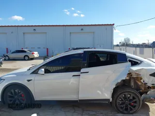 2023 Tesla Model X Plaid with VIN 7SAXCBE63PF405105, listed as a IAAI auction lot 41876918 with 22,475 mi miles and . Bid and sale history available at DreamBid. Image 15.