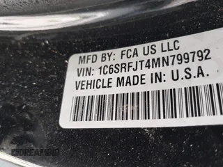 2021 Ram 1500 Laramie z VIN 1C6SRFJT4MN799792, wystawiony jako IAAI lot #41838329 z przebiegiem 106 968 mil mil oraz . Historia ofert i sprzedaży dostępna na DreamBid. Obrazek 9.