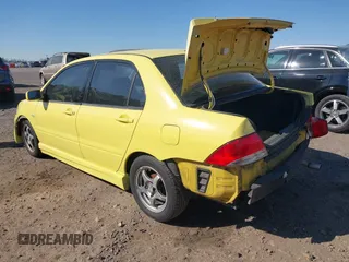 2002 Mitsubishi Lancer OZ-Rally with VIN JA3AJ86E32U081427, listed as a IAAI auction lot 41875587 with 190,214 mi miles. Bid and sale history available at carsss.com. Image 3.