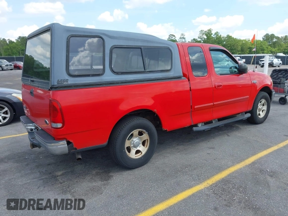 2003 Ford F-150 XL with VIN 1FTRX17243NA84413, listed as a IAAI auction lot 42132813 with 190,715 mi miles. Bid and sale history available at carsss.com. Image 4.