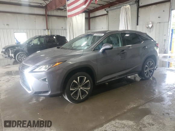 2019 Lexus RX 350 с VIN 2T2BZMCA6KC211279, выставлен на аукционе Copart как лот 63988605 с пробегом 66 232 миль миль и Списание • Salvage title. История ставок и продаж доступна на DreamBid. Изображение 1.