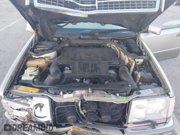 1994 Mercedes-Benz 400 with VIN WDBEA34E4RC015119, listed as a IAAI auction lot 40933590 with 77,554 mi miles. Bid and sale history available at carsss.com. Image 10.