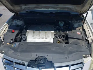 2006 Cadillac DTS 1SD z VIN 1G6KD57Y06U208812, wystawiony jako IAAI lot #42233924 z przebiegiem 120 244 mil mil oraz . Historia ofert i sprzedaży dostępna na DreamBid. Obrazek 10.
