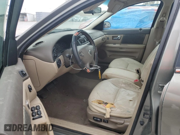 2001 Mercury Sable LS Premium with VIN 1MEFM55S81A608056, listed as a Copart auction lot 45936415 with 123,549 mi miles and Salvage Title. Bid and sale history available at DreamBid. Image 7.