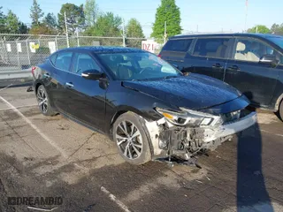 2017 Nissan Maxima SR with VIN 1N4AA6AP3HC453027, listed as a IAAI auction lot 41965266 with 42,073 mi miles. Bid and sale history available at carsss.com. Image 1.